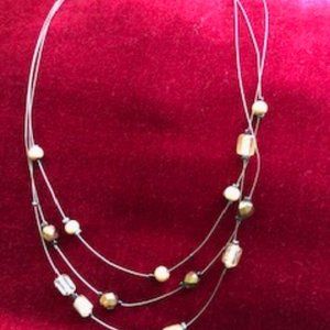 Multi-strand wire necklace in Neutrals. 16"